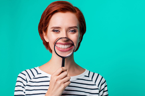 A smiling patient after full mouth reconstruction