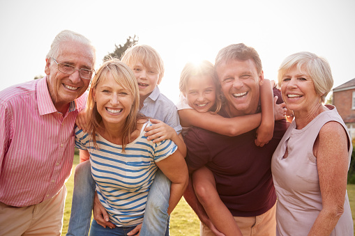 A smiling family of patients in Lake Success 